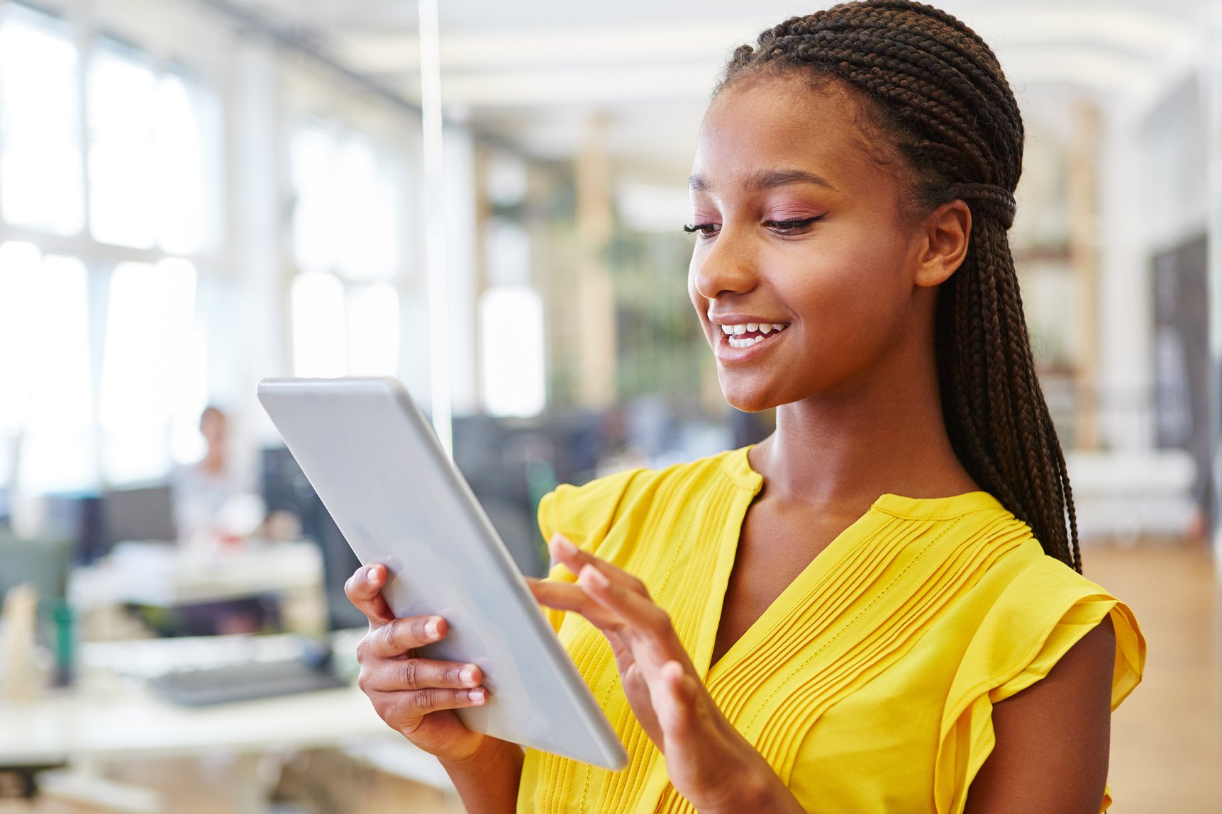 Woman Using Tablet for Social Media